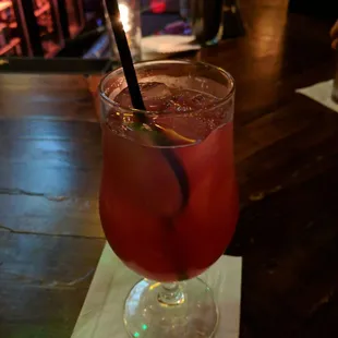 a drink in a glass with a straw