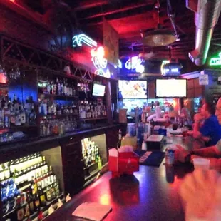 people sitting at the bar