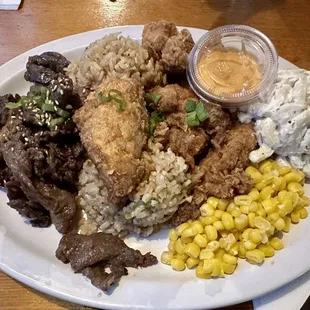 2-meat dish with garlic fried chicken, bulgolgi beef, garlic fried rice, Mac salad, and corn for only $17.50.