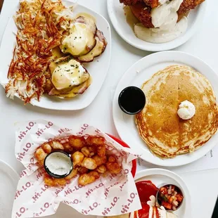 Spread of Breakfast Foods - Gary Cooper, Eggs Benedict, Pancakes, Burrito, and Spicy Cheese Curds