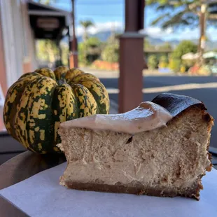 a slice of cheesecake with a bite taken out of it
