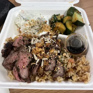 a meal in a styrofoam container