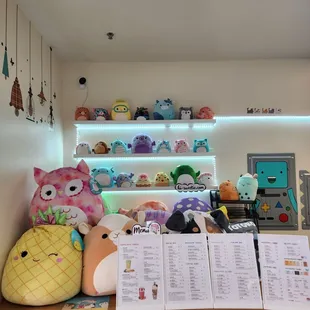 a shelf of stuffed animals
