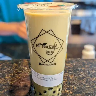 Matcha milk tea with boba $4.75