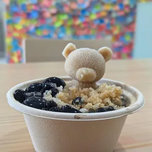 Our brown sugar shaved ice half eaten as the bear sinks into the abyss