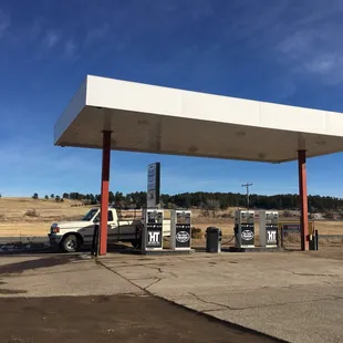 a truck at a gas station