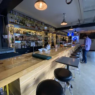 The full bar - bigger than you&apos;d think from how it looks out front!