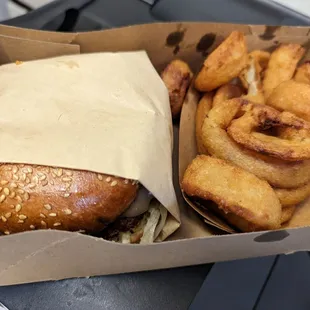 Hi-way cheeseburger with grilled onions and peppers jack cheese and onion rings