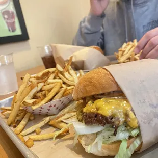 Cheeseburger with gluten free bun and a side of fries