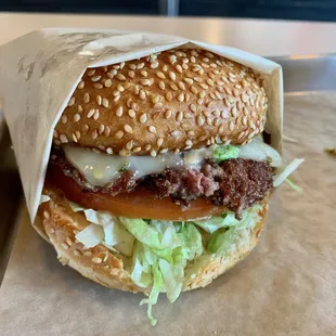 Cheeseburger with Cheese (Pepper Jack), Tomato, Lettuce, and Onions