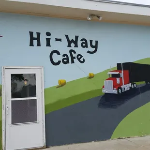 a truck on the side of the building