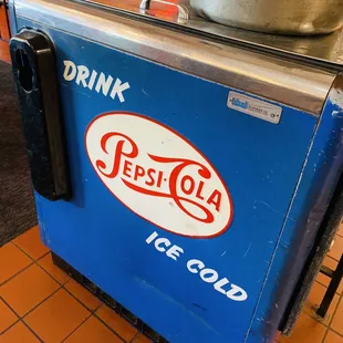 a pepsi cola machine
