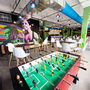 Play foosball, soccer pool, &amp; ping pong