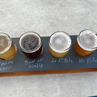 Hi-Wire Flagship flight their top 4 beers available year round