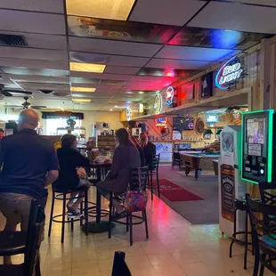 people sitting at the bar