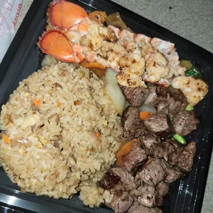 Lobster and filet mignon with fries rice