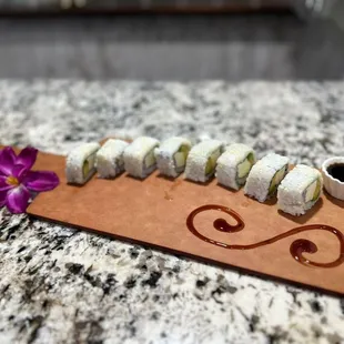 sushi rolls on a cutting board