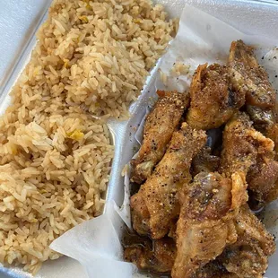 chicken and rice in a styrofoam container