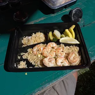 Shrimp on a bed and the butter seasoning is to die for.