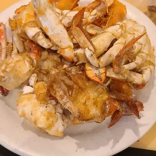 Just a plate of crab and fried shrimp underneath