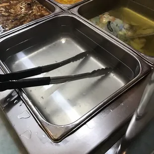 This was the ALL YOU CAN EAT crab leg pan 50 minutes later as we left. SMH....