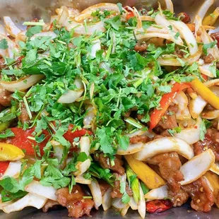 a stir fry with meat and vegetables