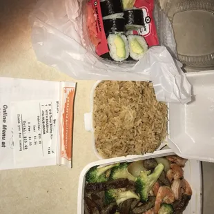 a tray of rice, broccoli, and shrimp