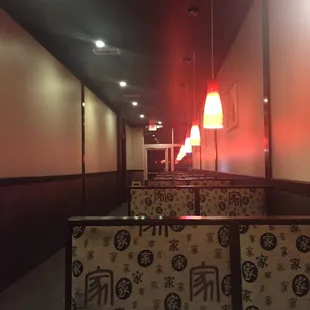 Booths line the side of the restaurant back to the restrooms.