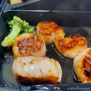 Scallops were cooked very well at least!