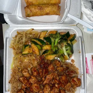 two take out containers of food