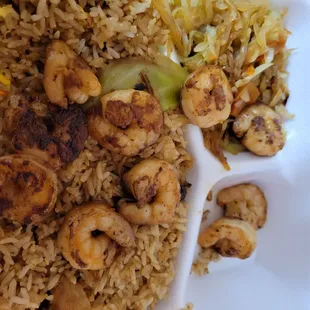 shrimp and rice in a styrofoam container
