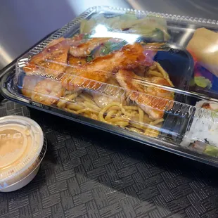 Salmon and Shrimp with Noodles, Veggies, California Roll, Spring Rolls x2, Dumplings x2 with Yummy Sauce