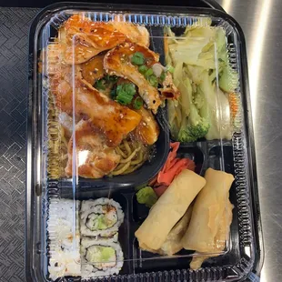Salmon and Shrimp with Noodles, Veggies, California Roll, Spring Rolls x2, Dumplings x2