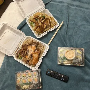 three take out containers of food