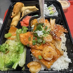 Bento box w "salmon" and shrimp. Salmon was like petrified wood.