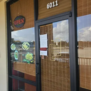 the front door of a restaurant