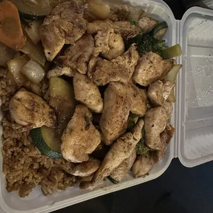 Lots of chicken, rice and vegetables! Plenty for 3 meals for me!
