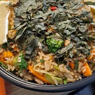 a bowl of rice and vegetables