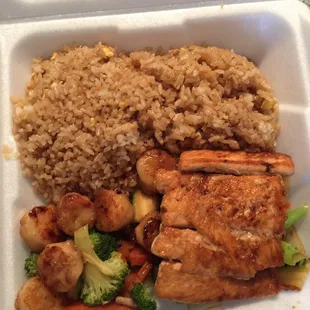 Salmon &amp; scallops with extra fried rice.. Tastes just as good or better than a sit down steakhouse for half the he price $15!