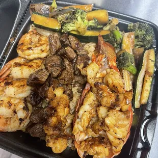 Trio plate shrimp, steak , and lobster