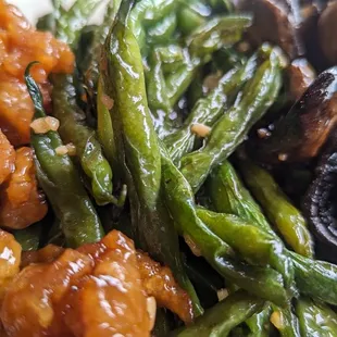 Orange chicken, green beans, mushrooms