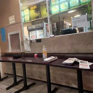 a row of tables in a restaurant