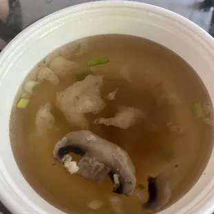 Clear soup. Best part of the meal and the only food item that tastes like it has salt!