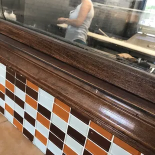 a woman cooking in a kitchen