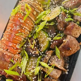 Lobster and Filet Combo with fried rice must try with our famous garlic butter and diablo dipping sauces