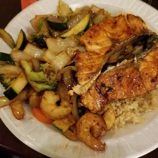 Hibachi salmon adding shrimp.