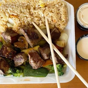 Steak hibachi lunch - $7.99 with rice and hibachi veggies and white sauce!