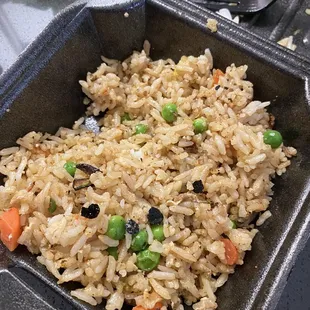 Fried rice BUT mine had a lot of black char in it! I was not happy at all!!!! At first I thought it may be cut up seaweed but it wasn't!