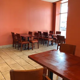 Places to sit and eat inside.