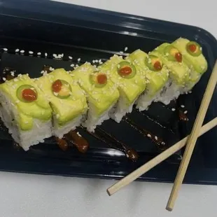 Luna roll 
IN: shrimp, cucumber   and spicy mayo 
OUT: avocado , eel sauce and sesame seeds
